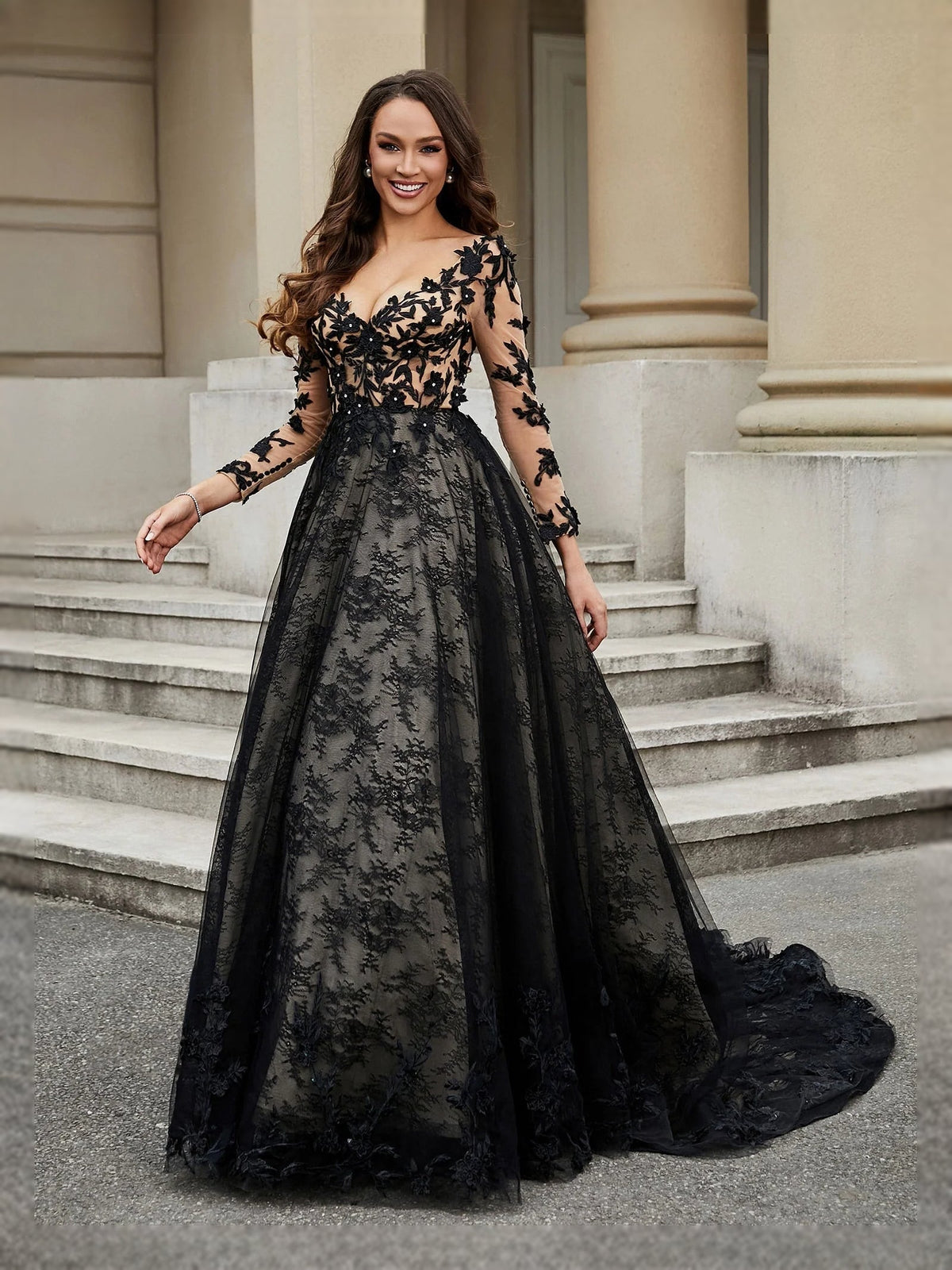 Black V-neck tulle wedding dress with floral applique bodice and voluminous A-line skirt