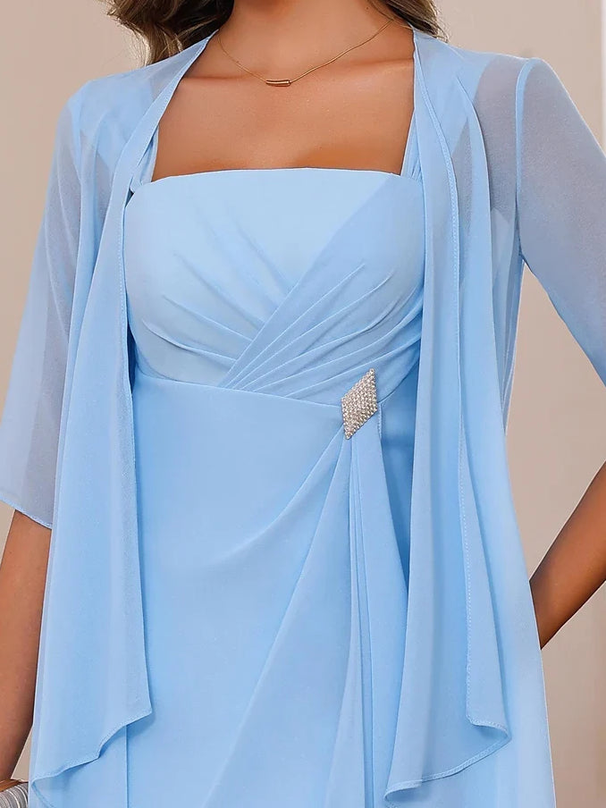 Light blue chiffon dress bodice with square neckline, draped folds, and jeweled center
