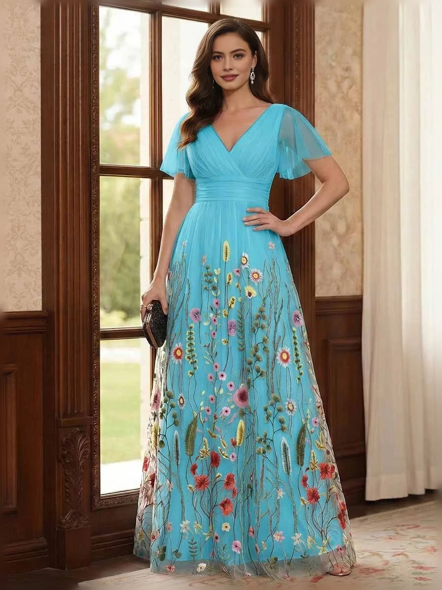 Aqua V-neck A-line tulle dress with ruched waist, flutter short sleeves, and floral embroidery
