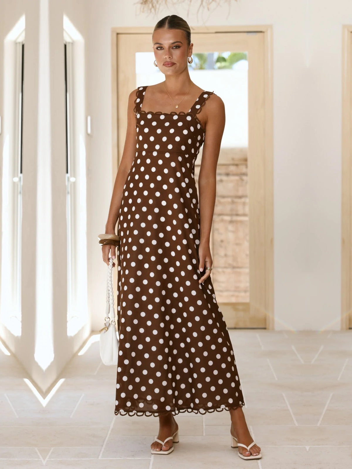 Brown a-line maxi formal dress with printed pattern, alternate view showing the skirt