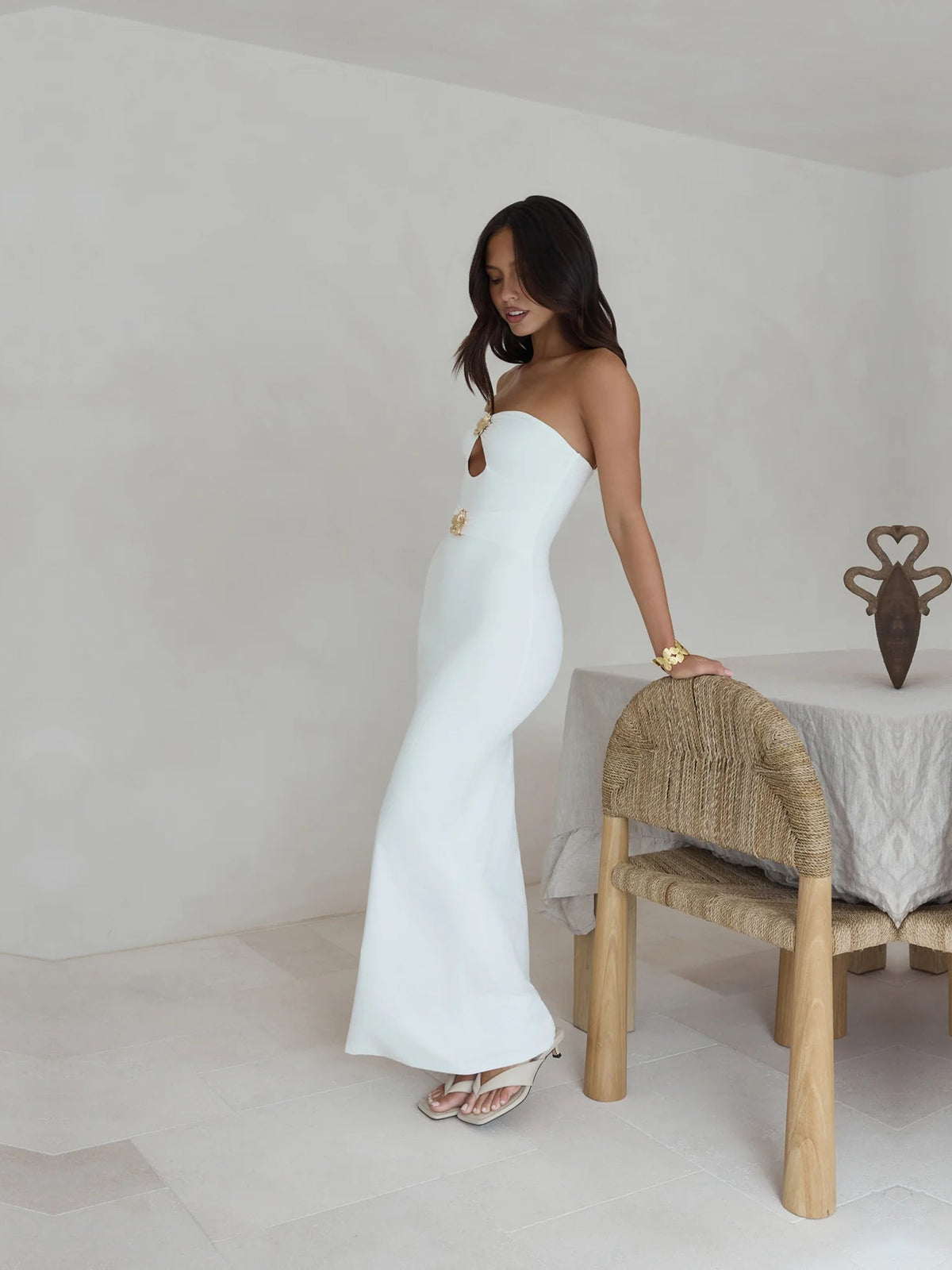 White a-line maxi formal dress with strapless neckline, alternate view showing the skirt