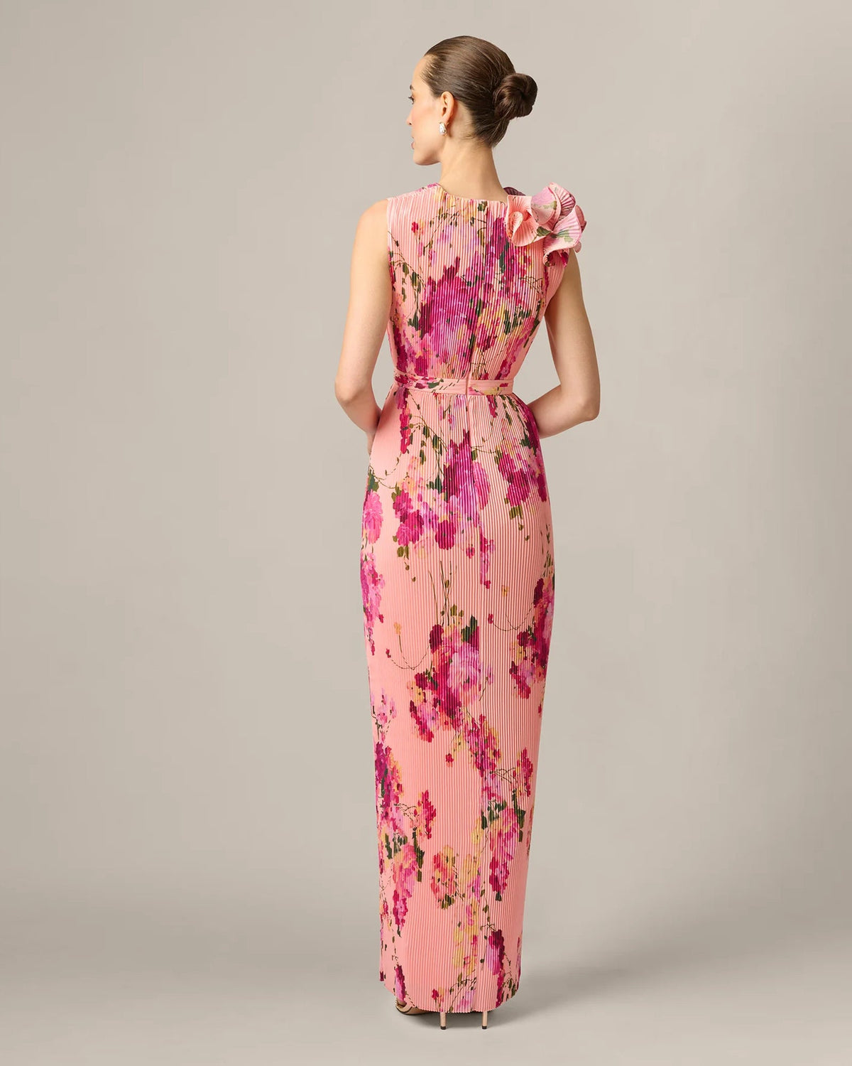 Pink floral maxi dress with back ruffle detailing and sleeveless column silhouette