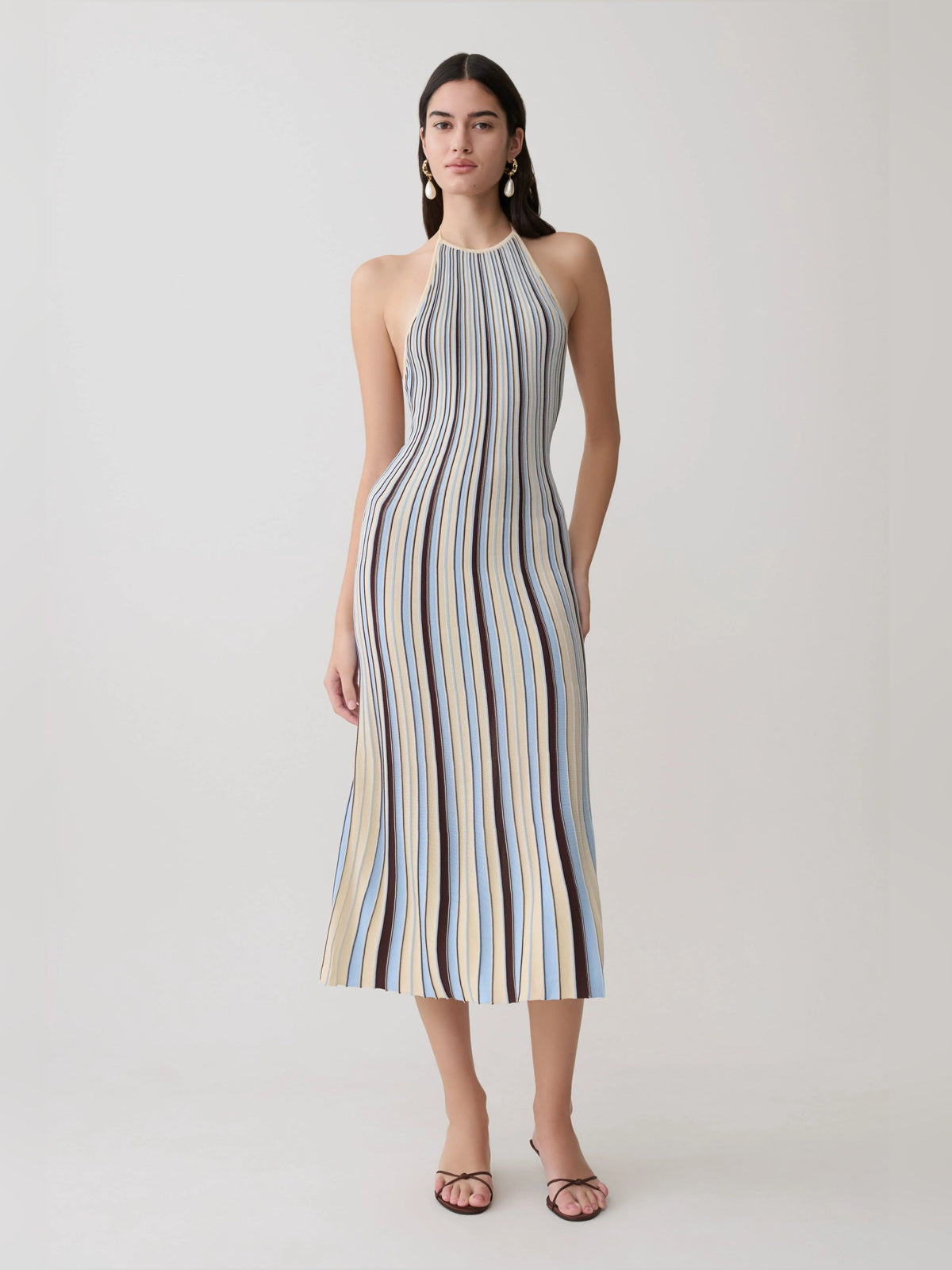 Halterneck knit midi formal dress front view with vertical cream, blue, and brown stripes.