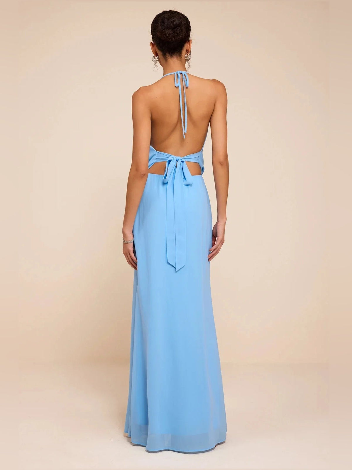 Blue open-back maxi chiffon dress with tie halter straps and column silhouette