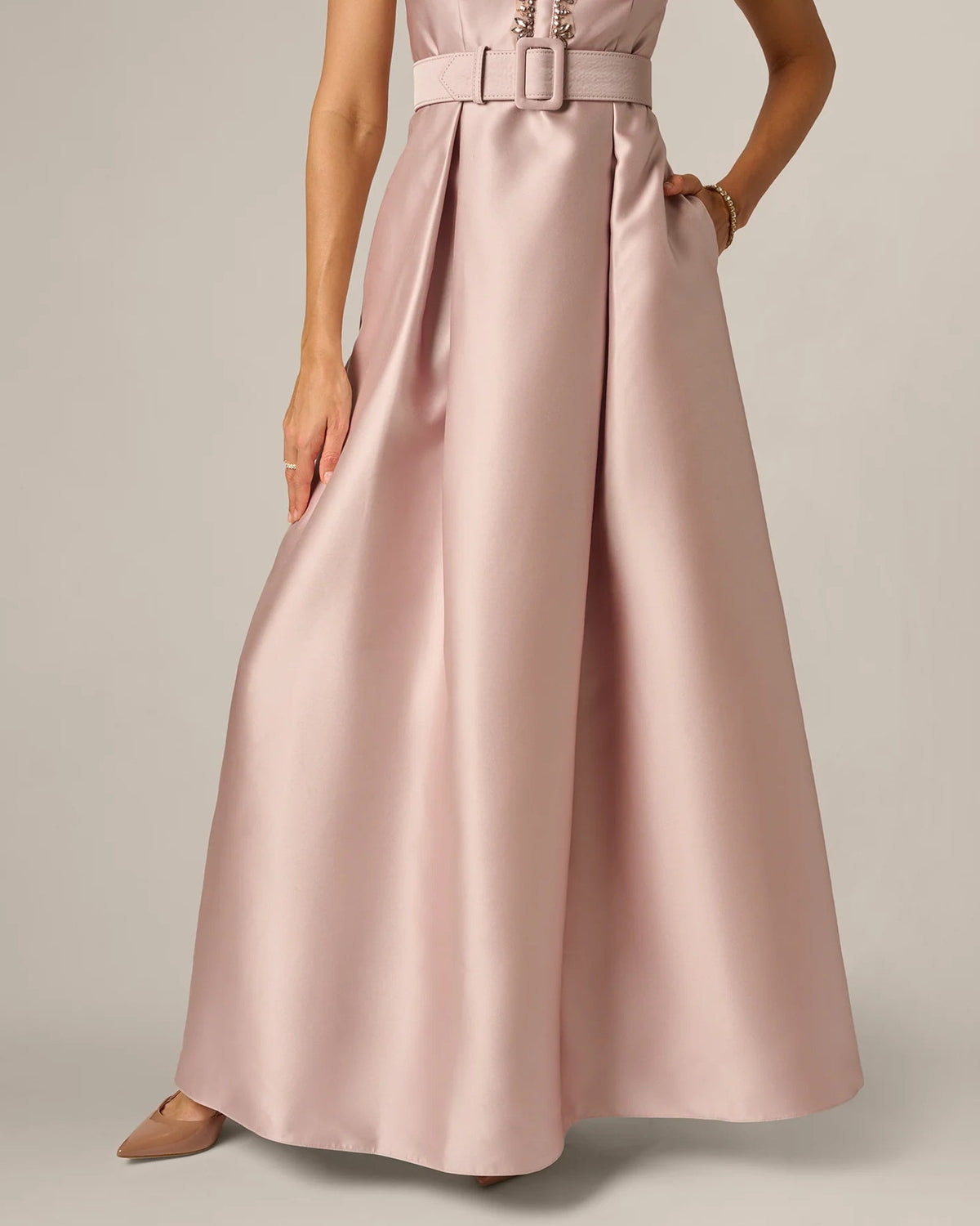 Blush pink A-line maxi skirt with satin waist belt and pleated drape