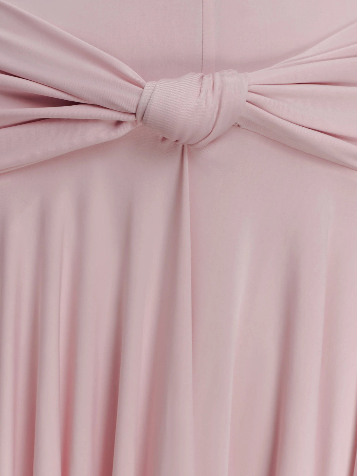 Pink gathered waist knot with flowing pleated fabric