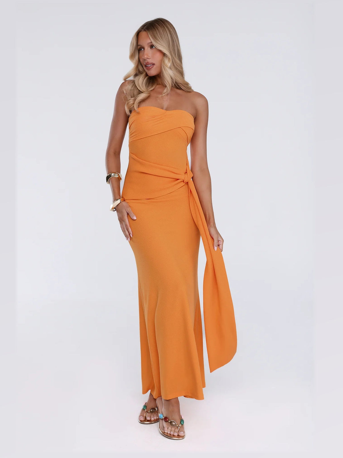Orange maxi formal dress, alternate full-length view showing the hem