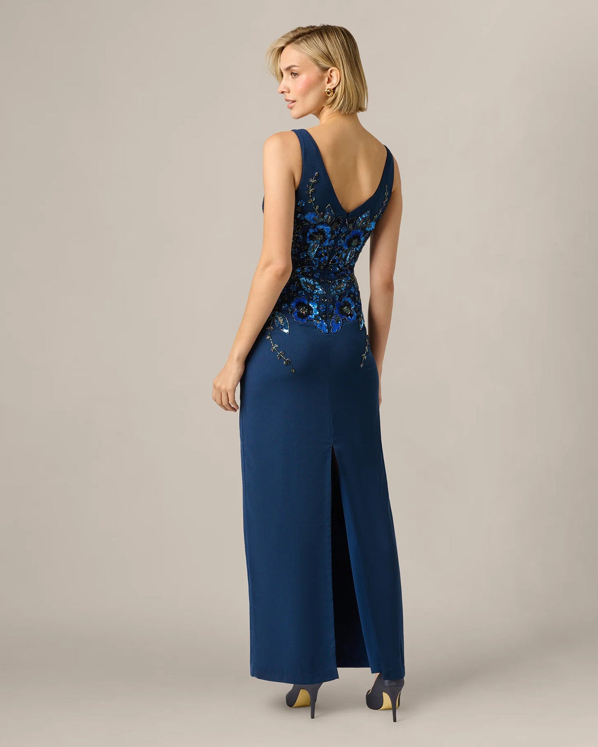 Light navy blue sleeveless maxi dress with low back and front slit skirt
