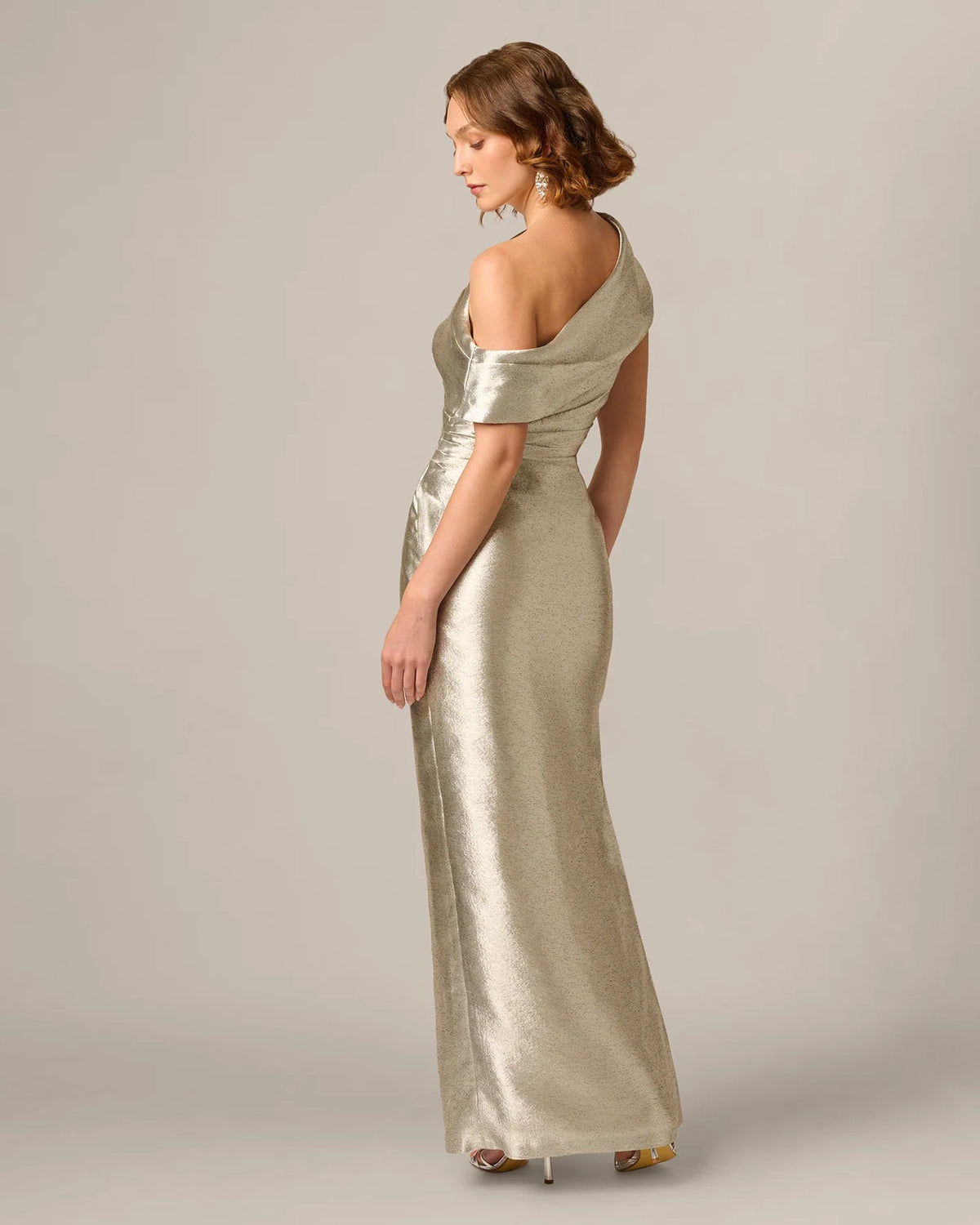 Light gold metallic draped one-shoulder maxi dress with back waist ruching