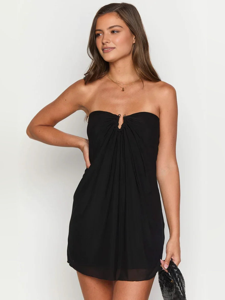 Black strapless A-line mini dress with center drawstring bodice and sheer outer