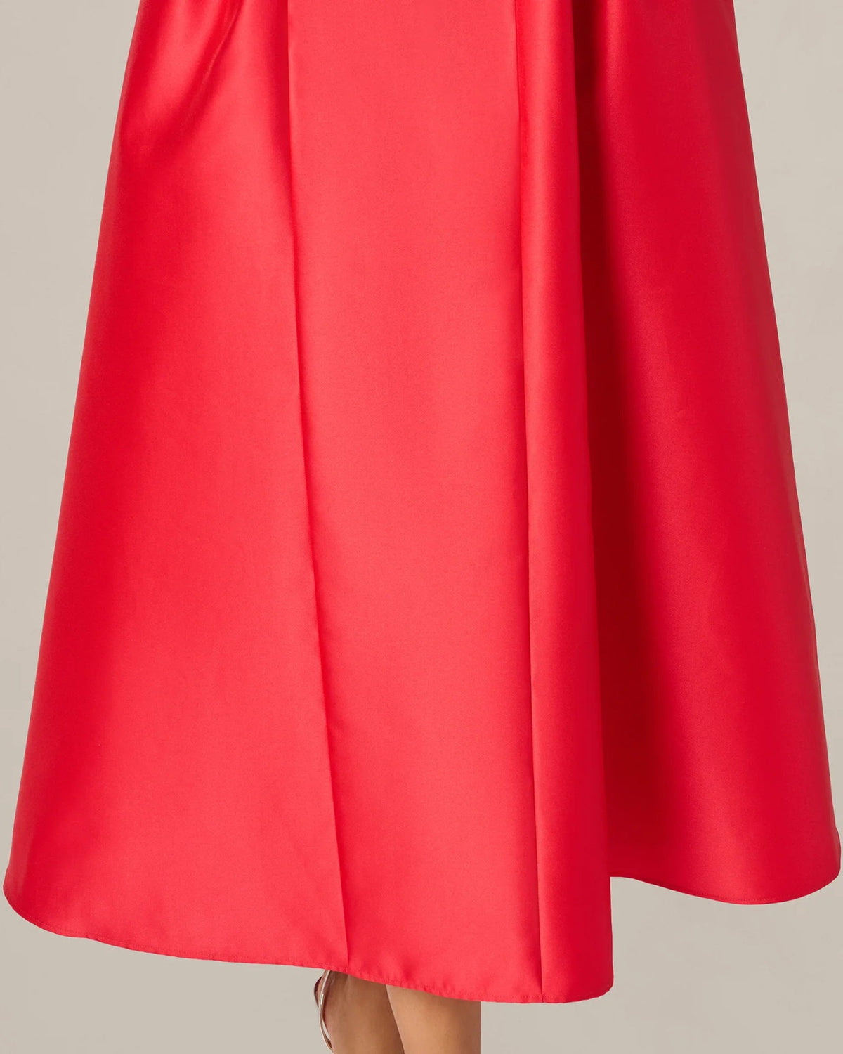 Coral red midi skirt with pleats and flare hem