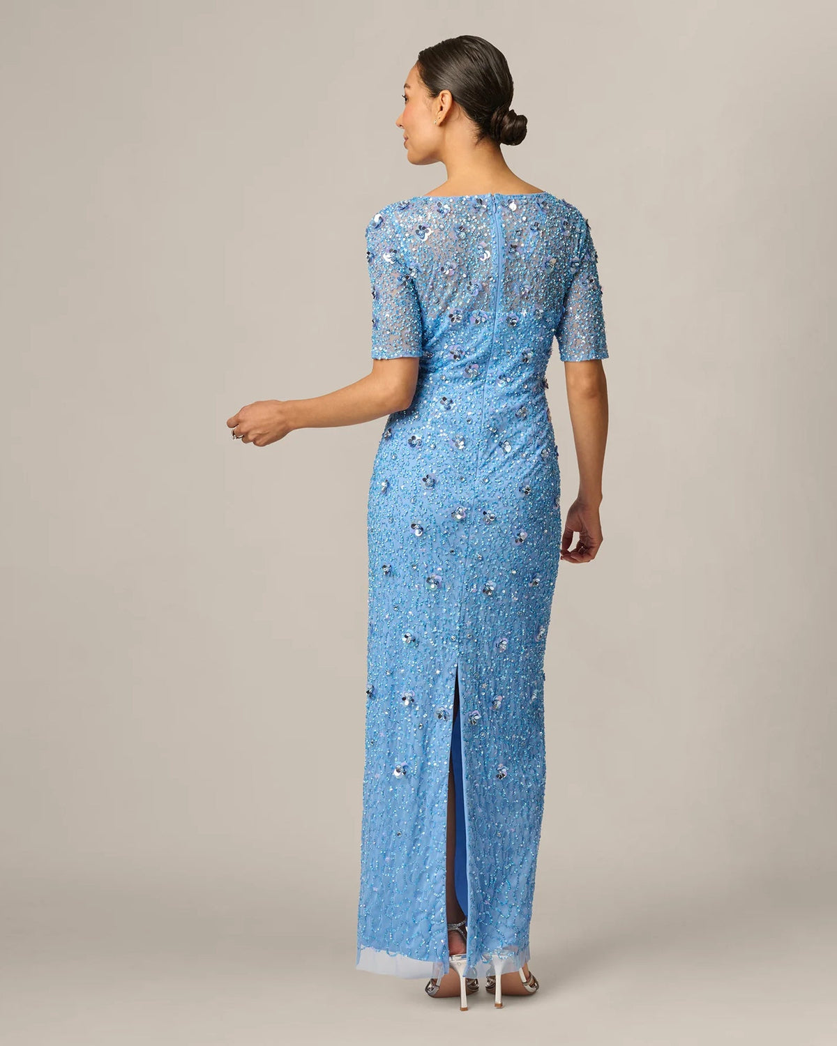 Light blue embellished maxi dress back view with short sleeves and long A-line hem