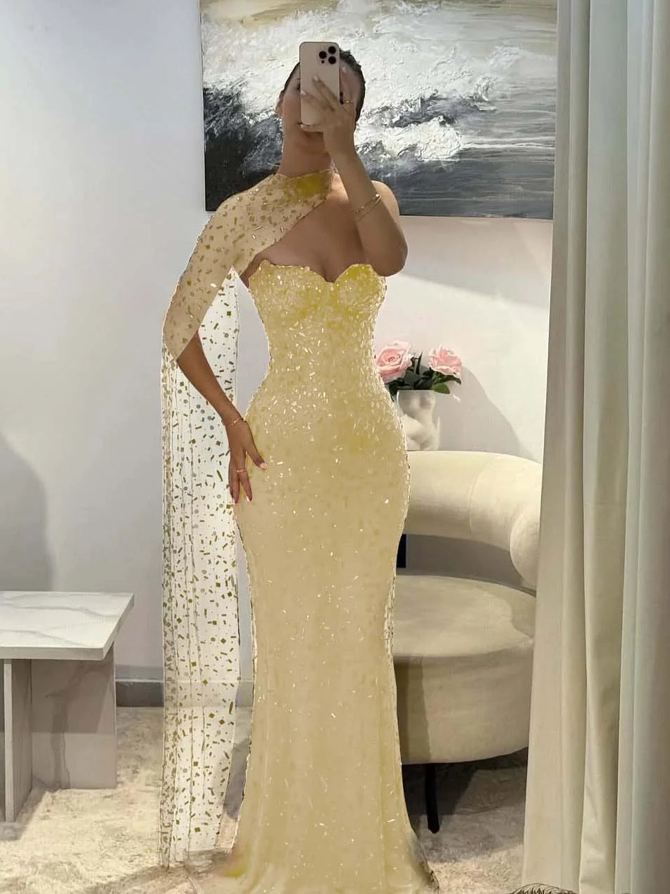 Pale yellow sequin sweetheart mermaid prom dress with long sheer side drape, floor-length