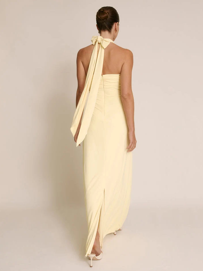 Lemon yellow floor-length halter sheath dress with crisscross open-back straps