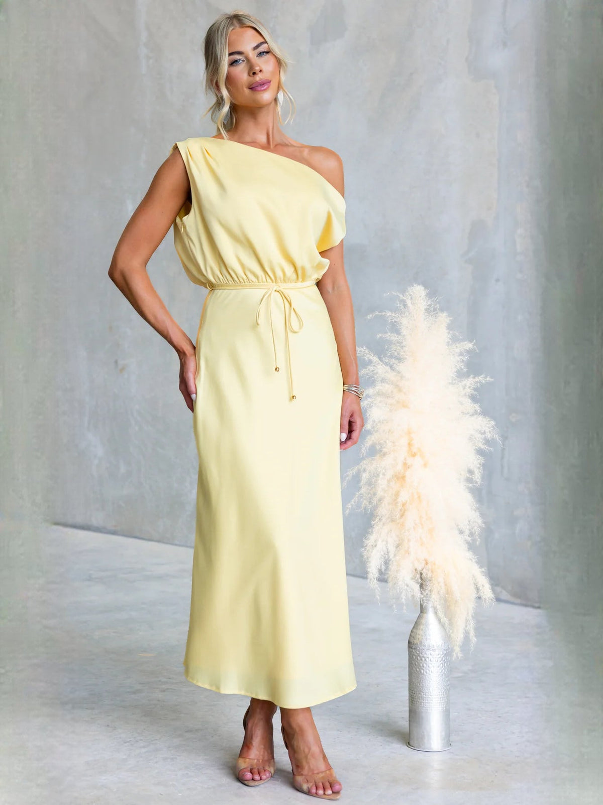 Black sheath maxi formal dress with draping, alternate full-length view showing the skirt