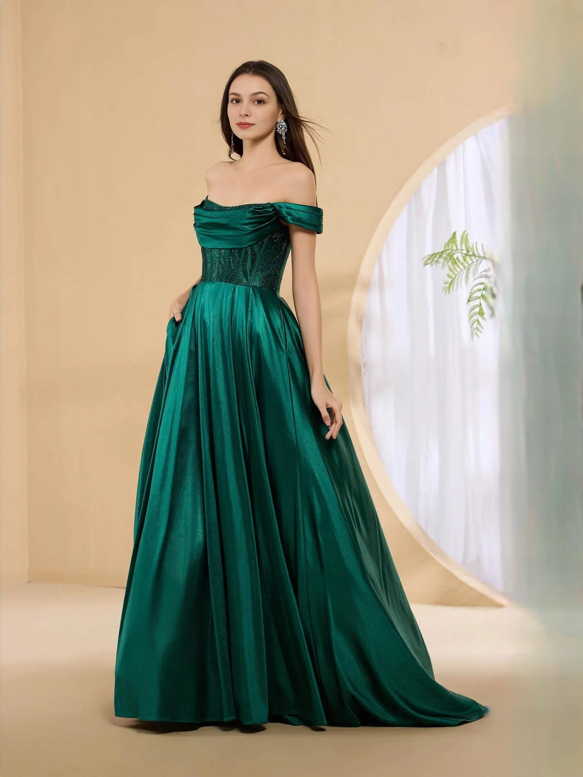 Off-shoulder corset formal dress in dark green with off-shoulder pleated floor-length skirt