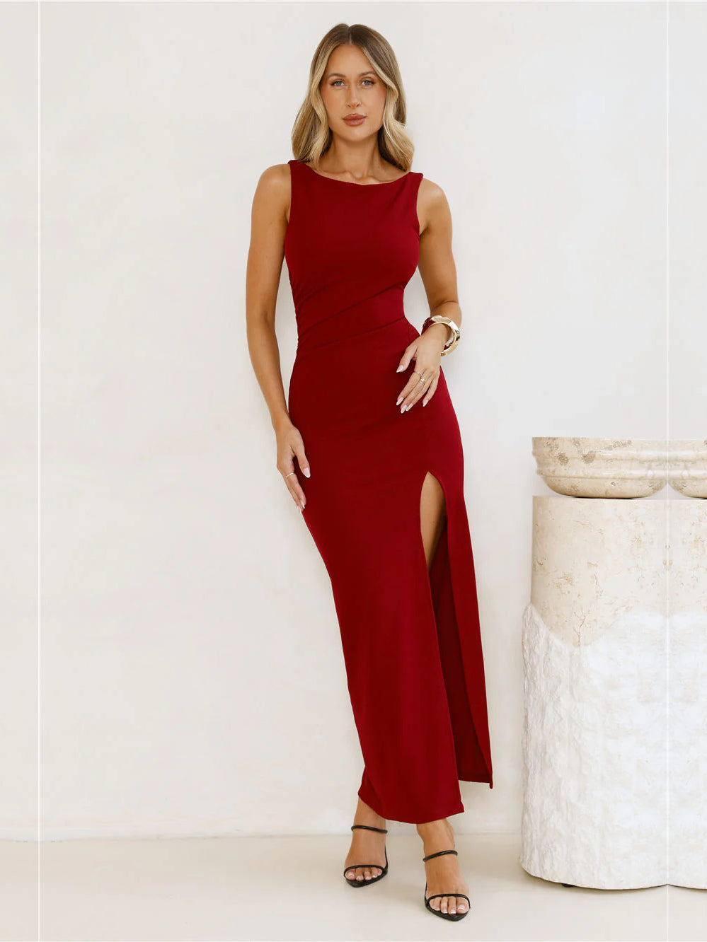 Burgundy sheath maxi formal dress with skirt slit, alternate view showing the skirt