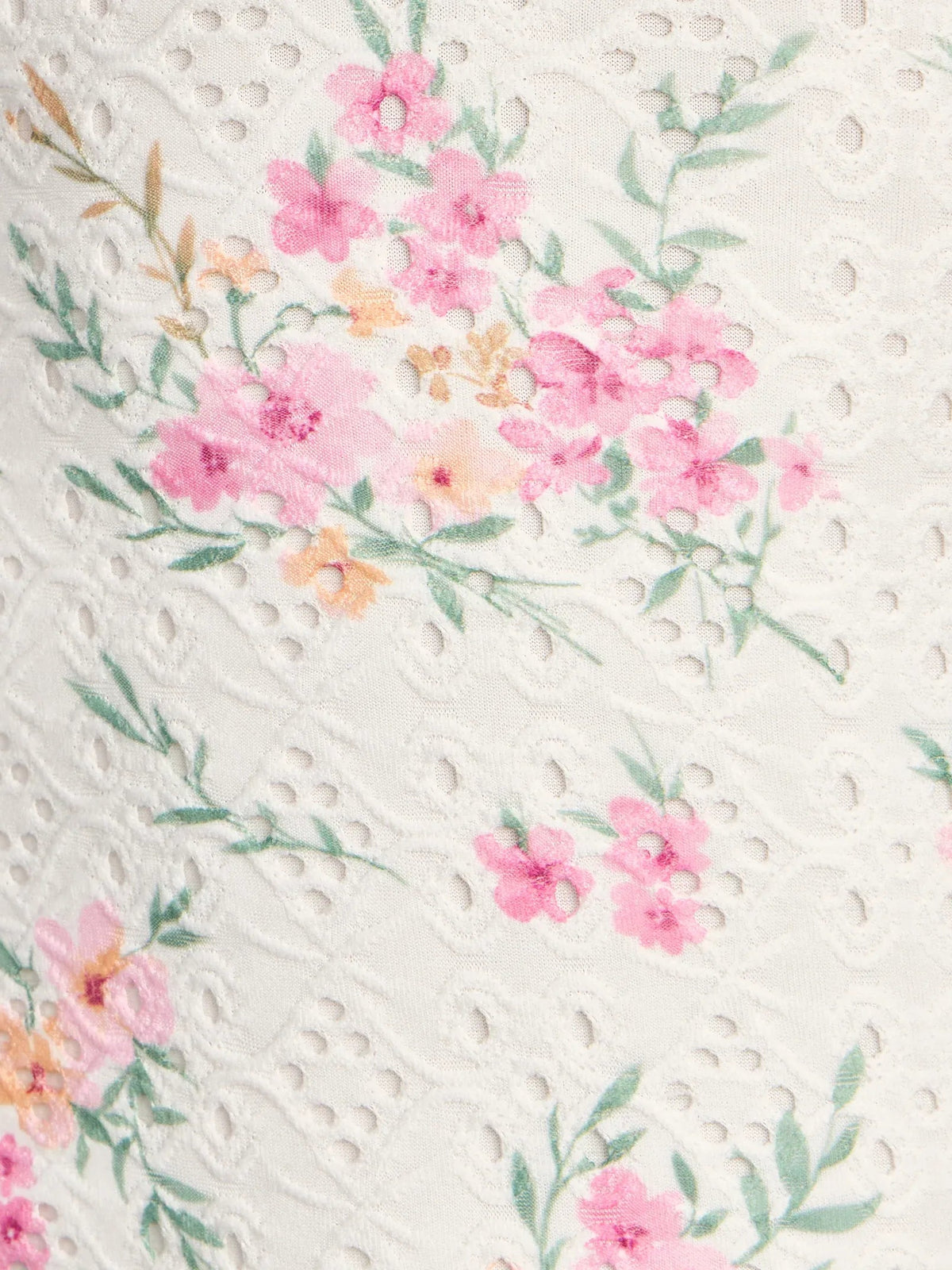 Ivory fabric with pink and green floral print textured pattern
