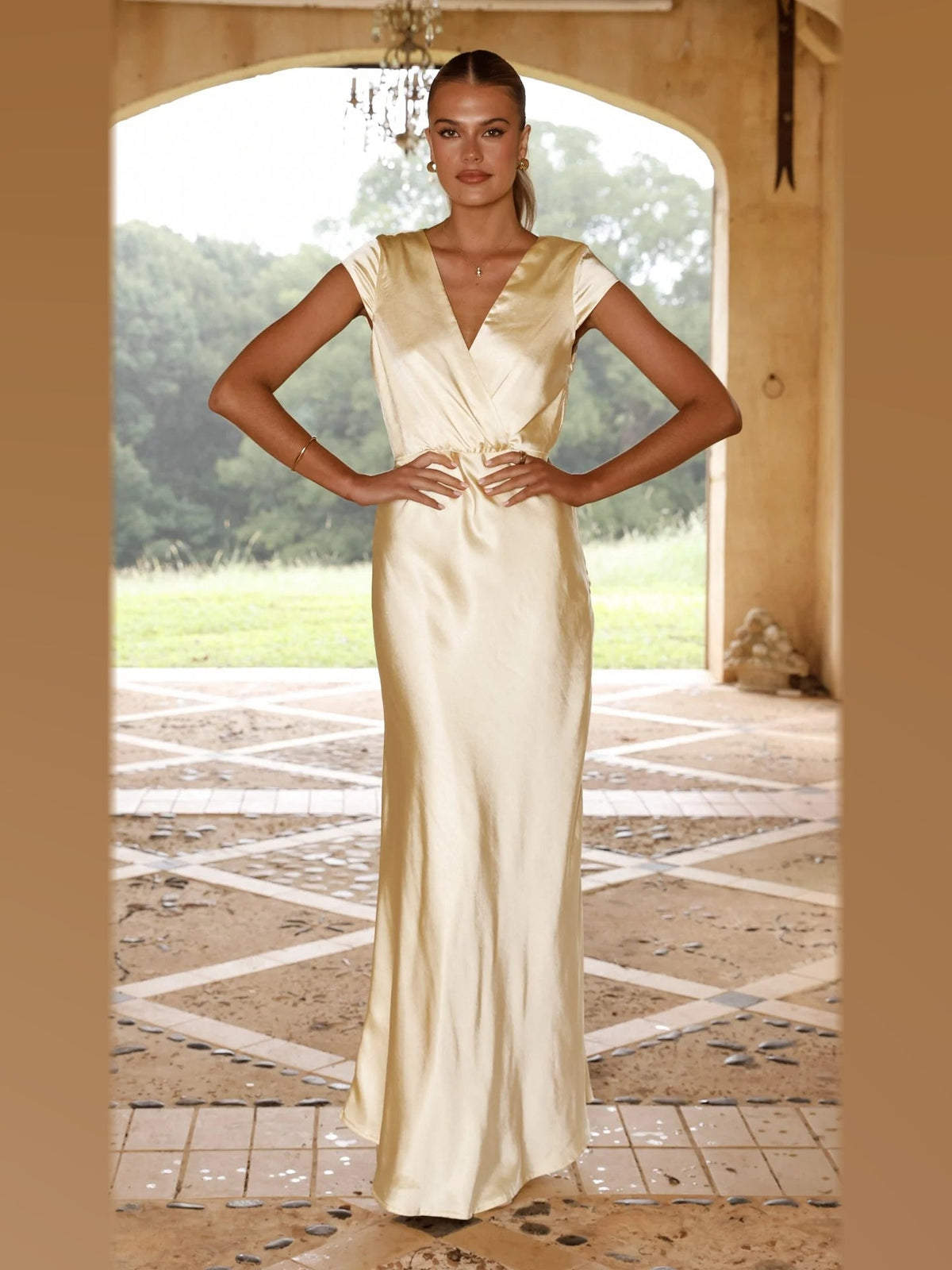Yellow maxi formal dress, alternate full-length view showing the hem