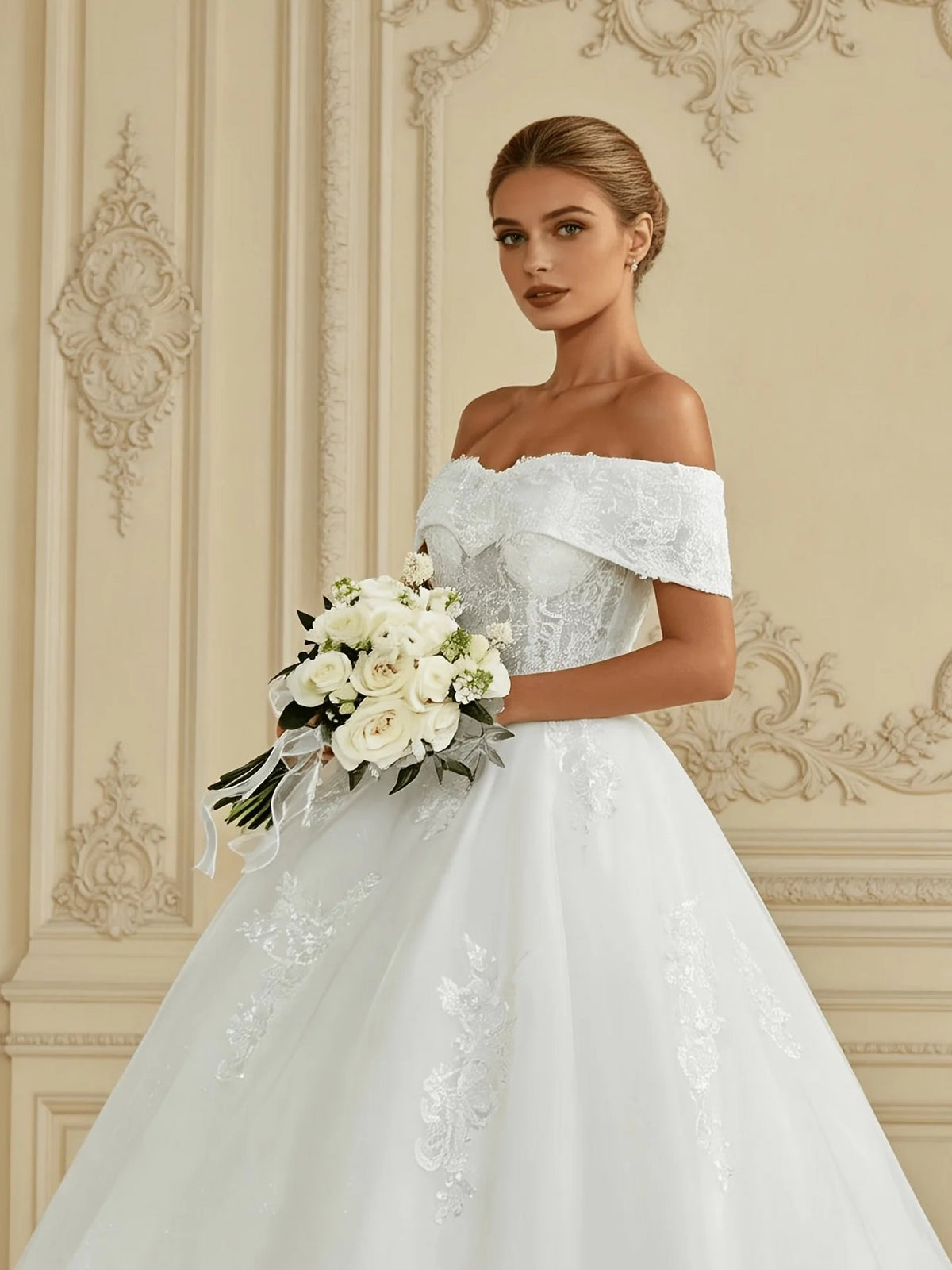 Ivory off-shoulder corset bodice wedding dress with floral appliques and bouquet