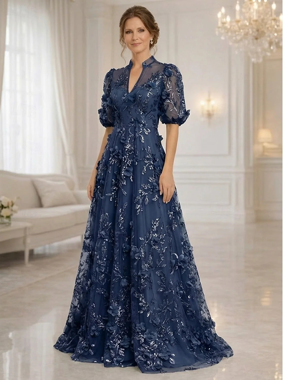 Navy blue tulle A-line gown, high neck, short puff sleeves, layered floral detailing