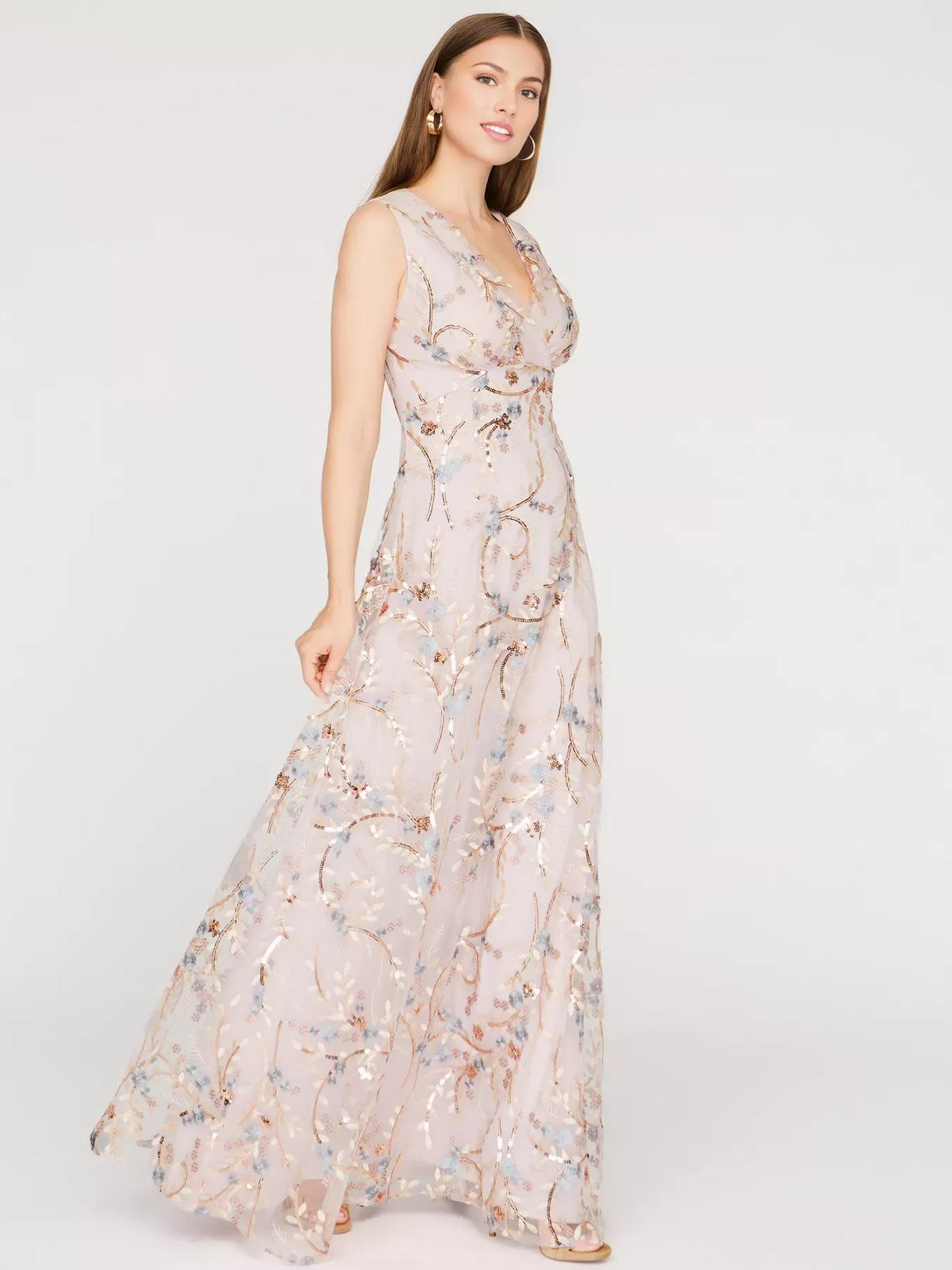 Beaded floral print V-neck floor-length formal dress, sleeveless, side view with ornate beading