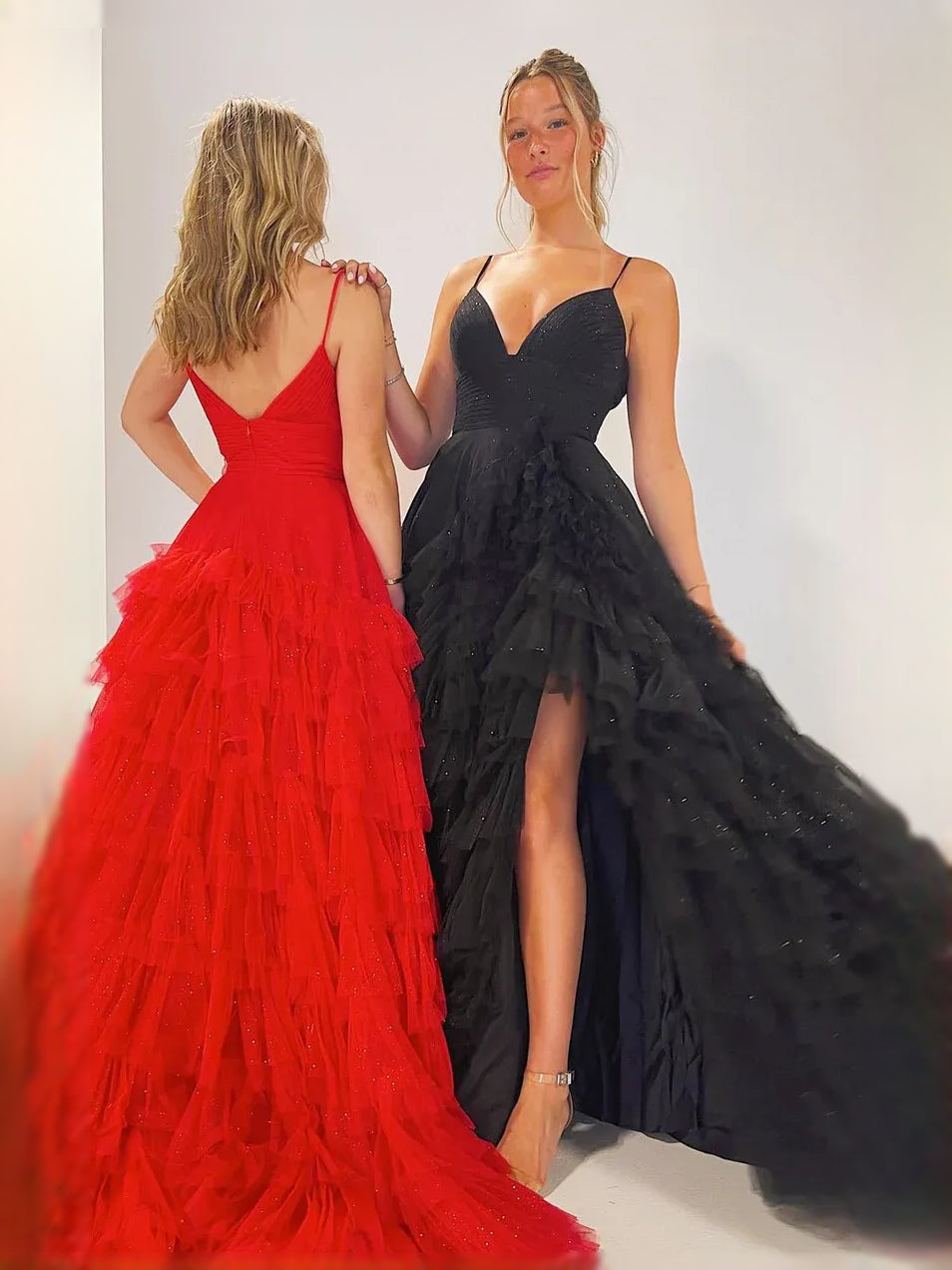 Tulle prom dresses in red and black: V-neck A-line maxi with layered ruffle skirt and slit