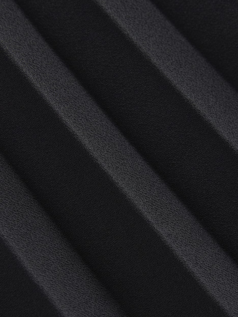 Black textured crepe fabric close-up