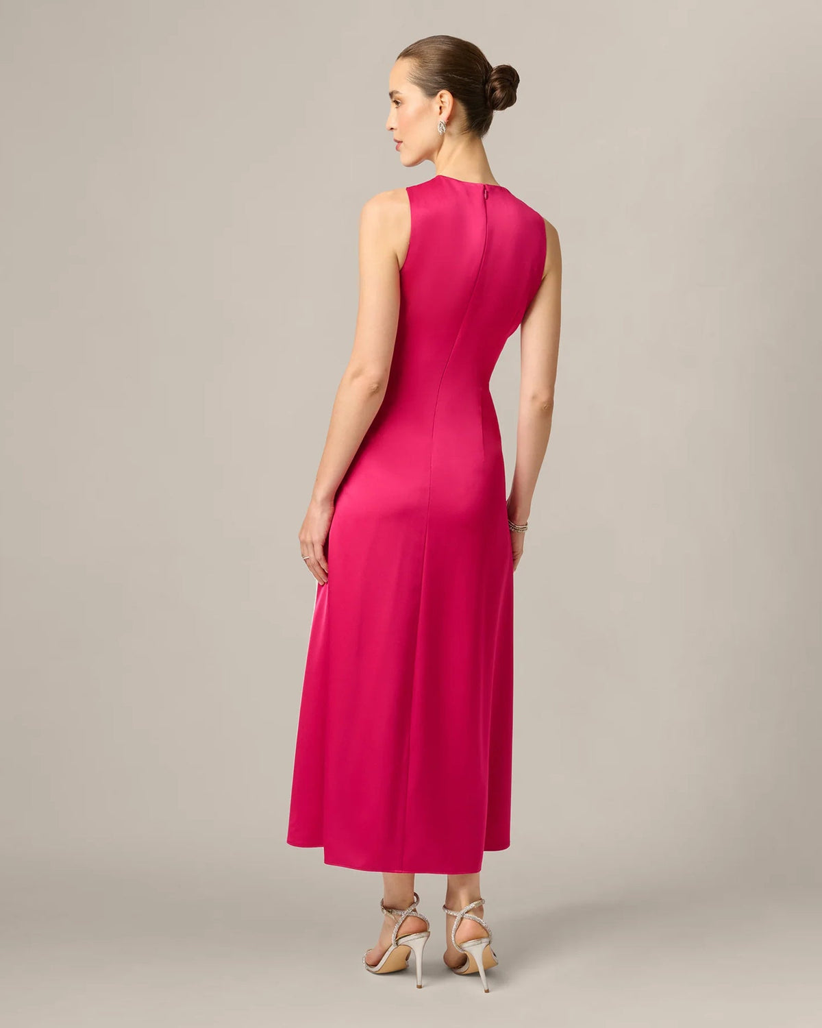 Bright rose sleeveless maxi dress with V-back and fitted seam shaping