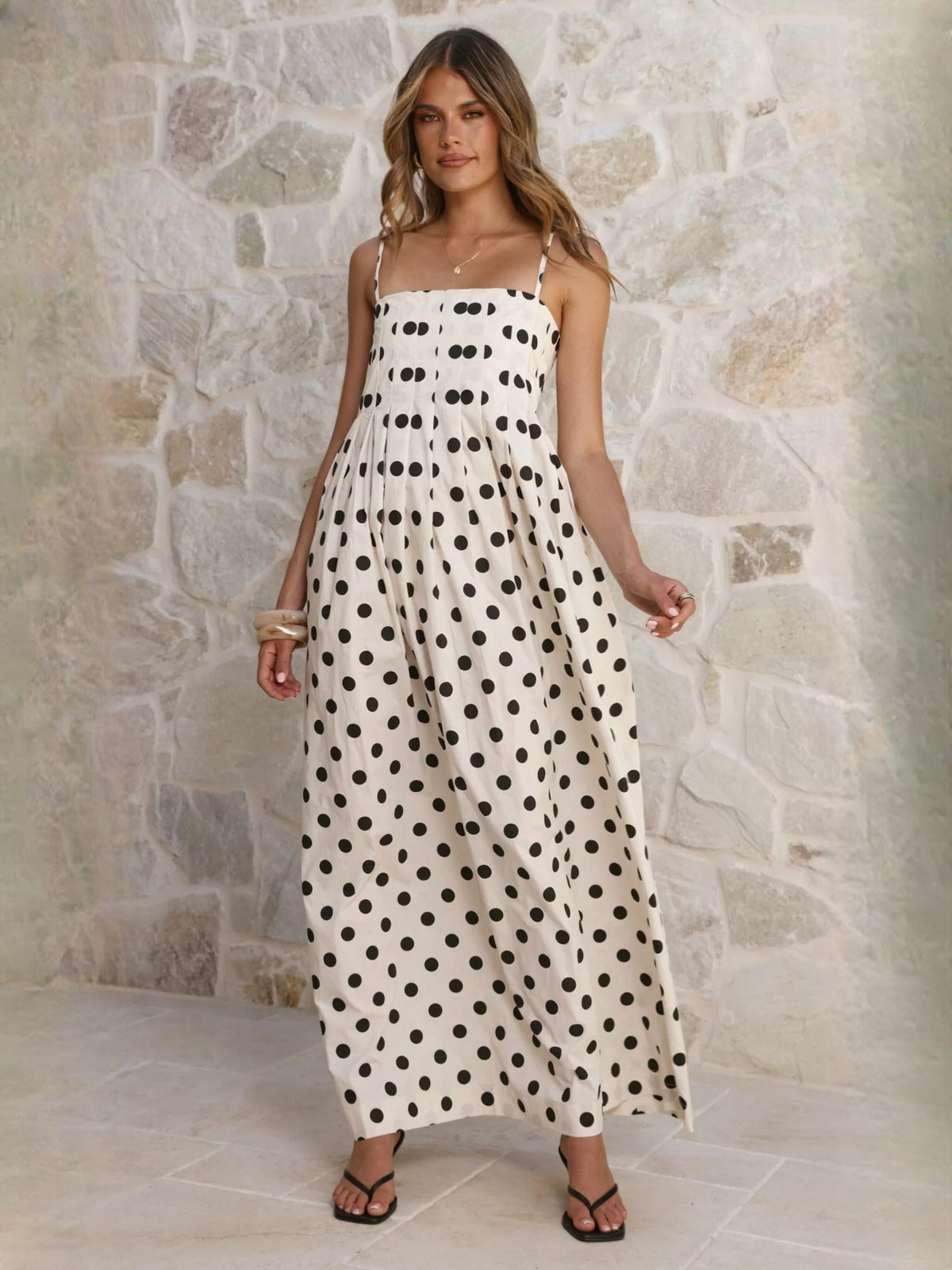 Black a-line maxi formal dress with printed pattern, alternate full-length view showing the skirt