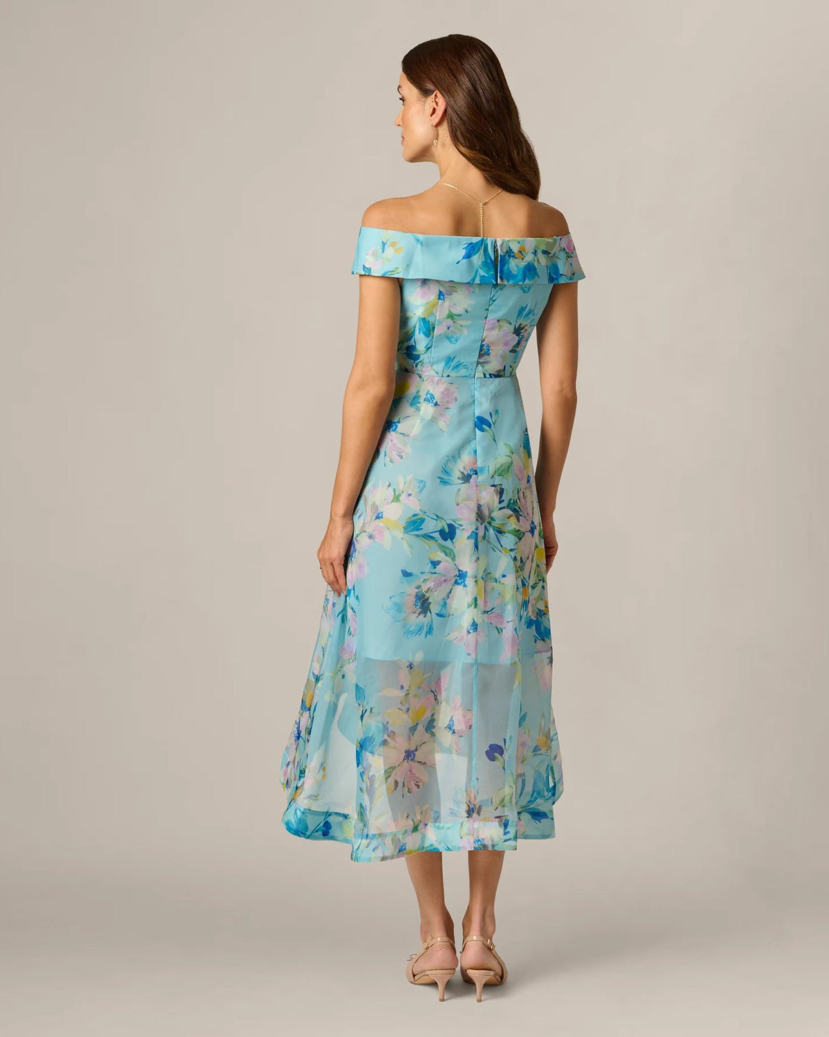 Back view of blue floral off-shoulder midi dress with layered A-line skirt
