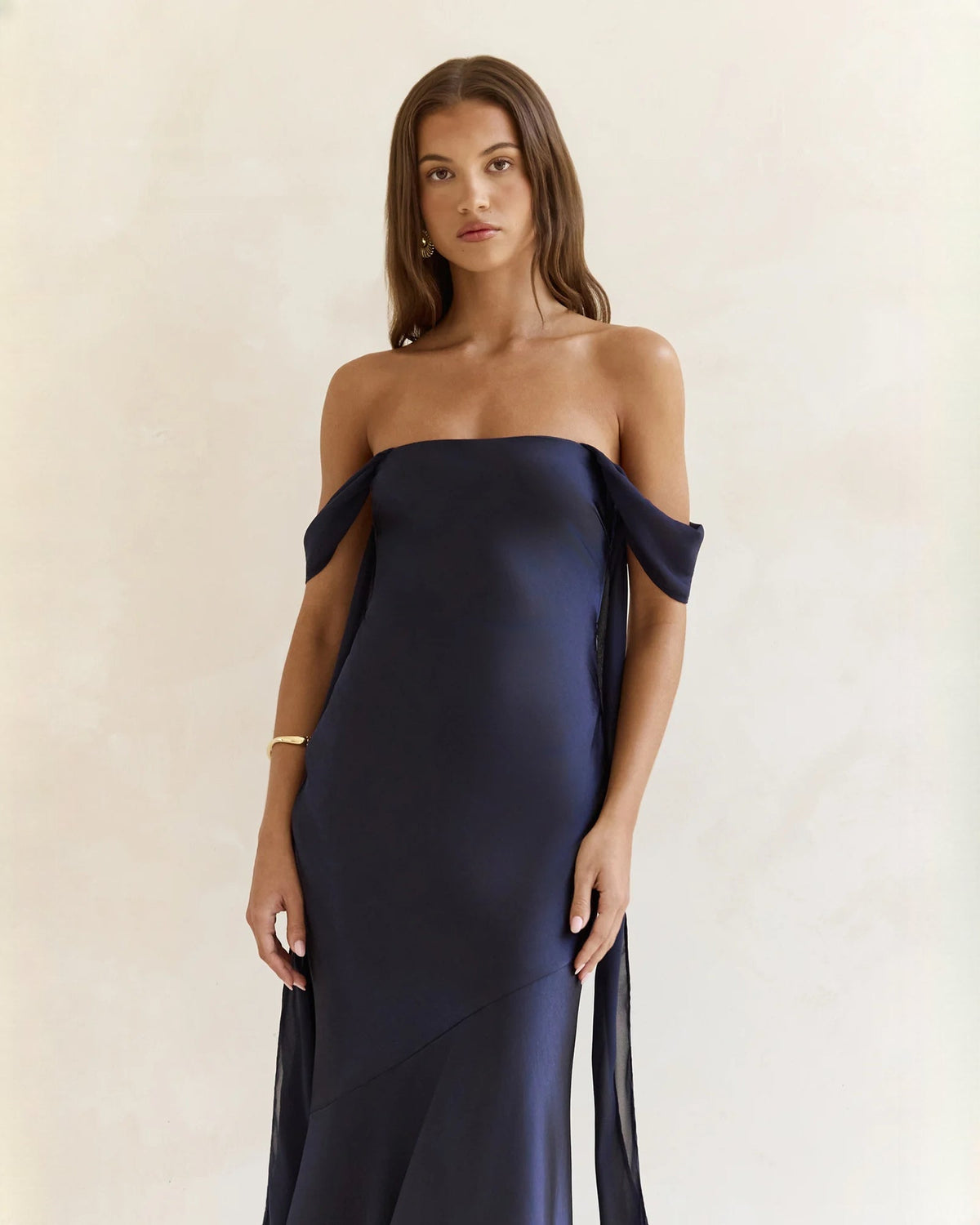 Navy satin off-shoulder A-line maxi dress with asymmetric side drape