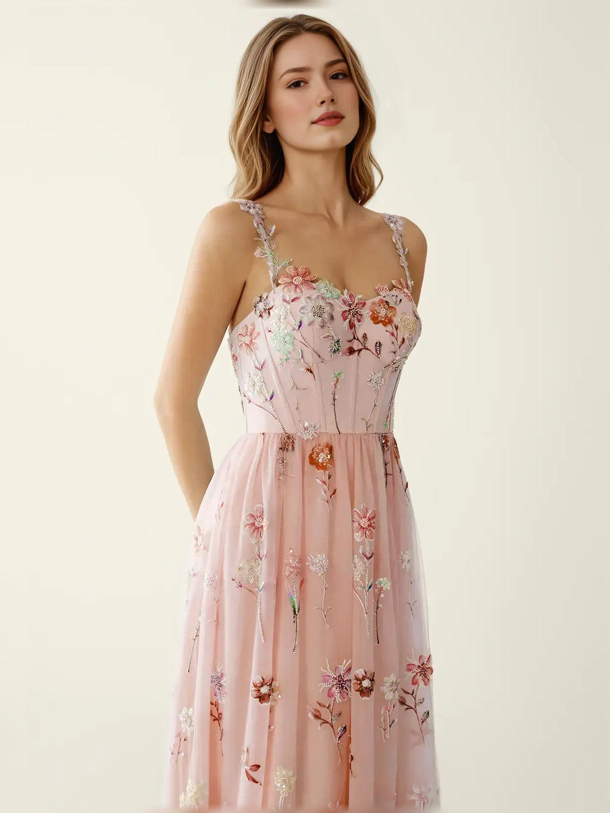 Blush pink floral sequin fit-and-flare formal dress front view with thin straps