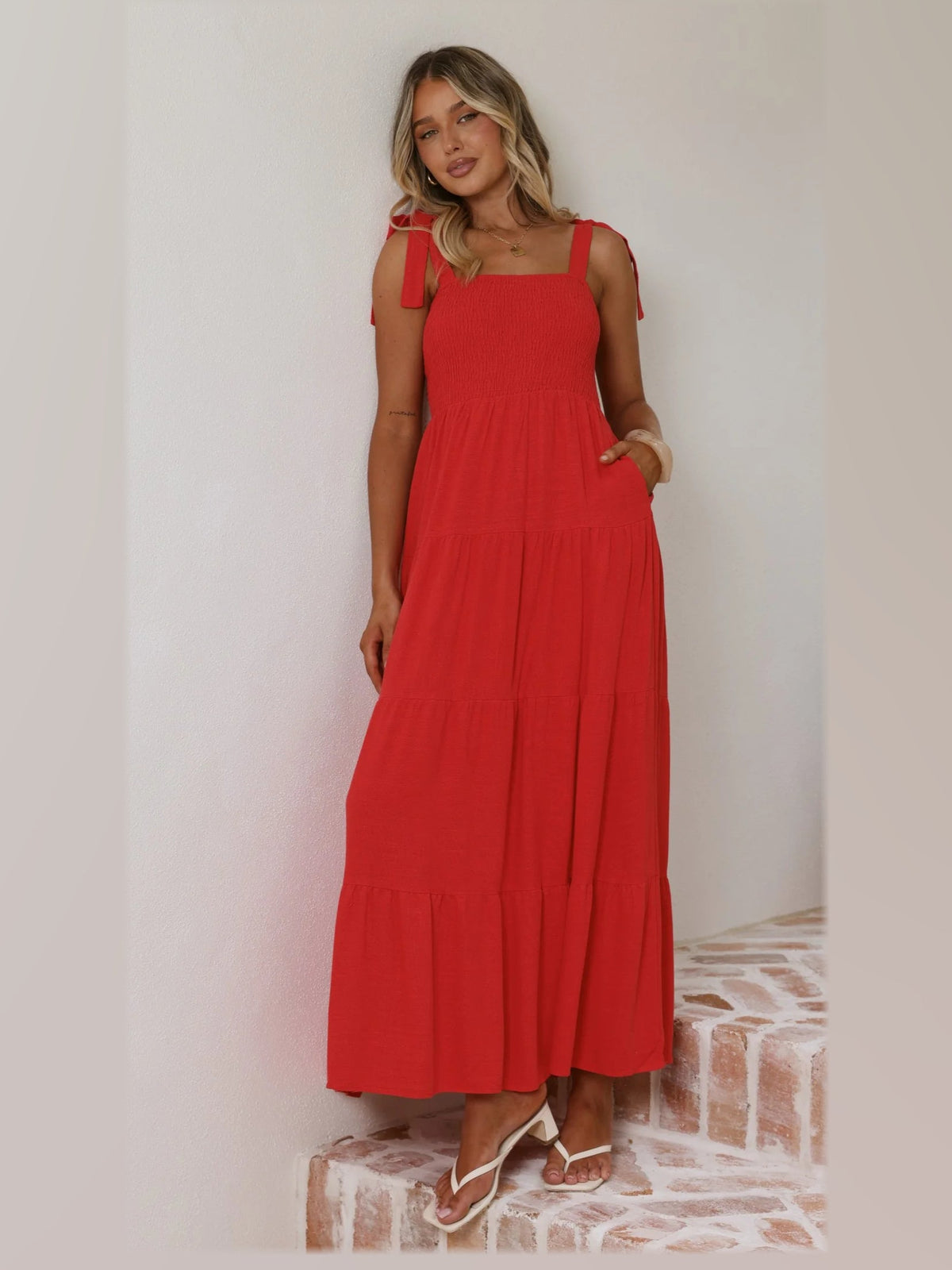 Red maxi formal dress, alternate full-length view showing the hem