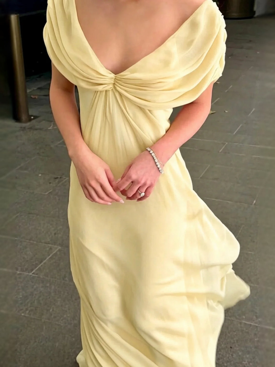 Pale yellow chiffon bridesmaid dress with ruched draped V-neck, sleeveless A-line