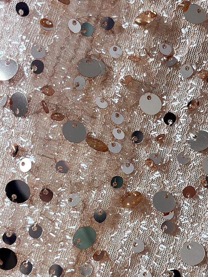 Gold sequin fabric with reflective round sequins on satin base