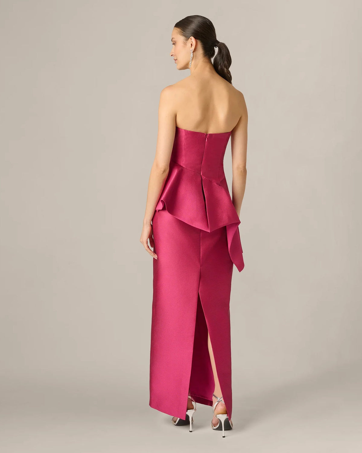 Bright rose strapless maxi dress, open-back silhouette with ruffled peplum