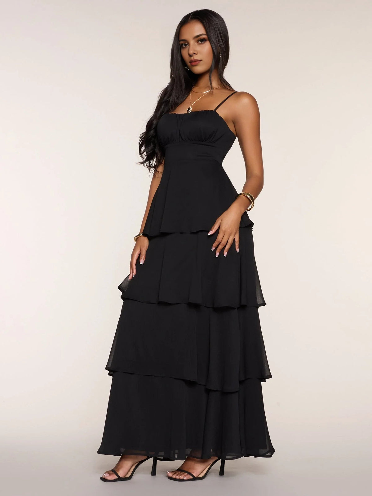 Black chiffon prom dress with tiered ruffle skirt and slim spaghetti straps