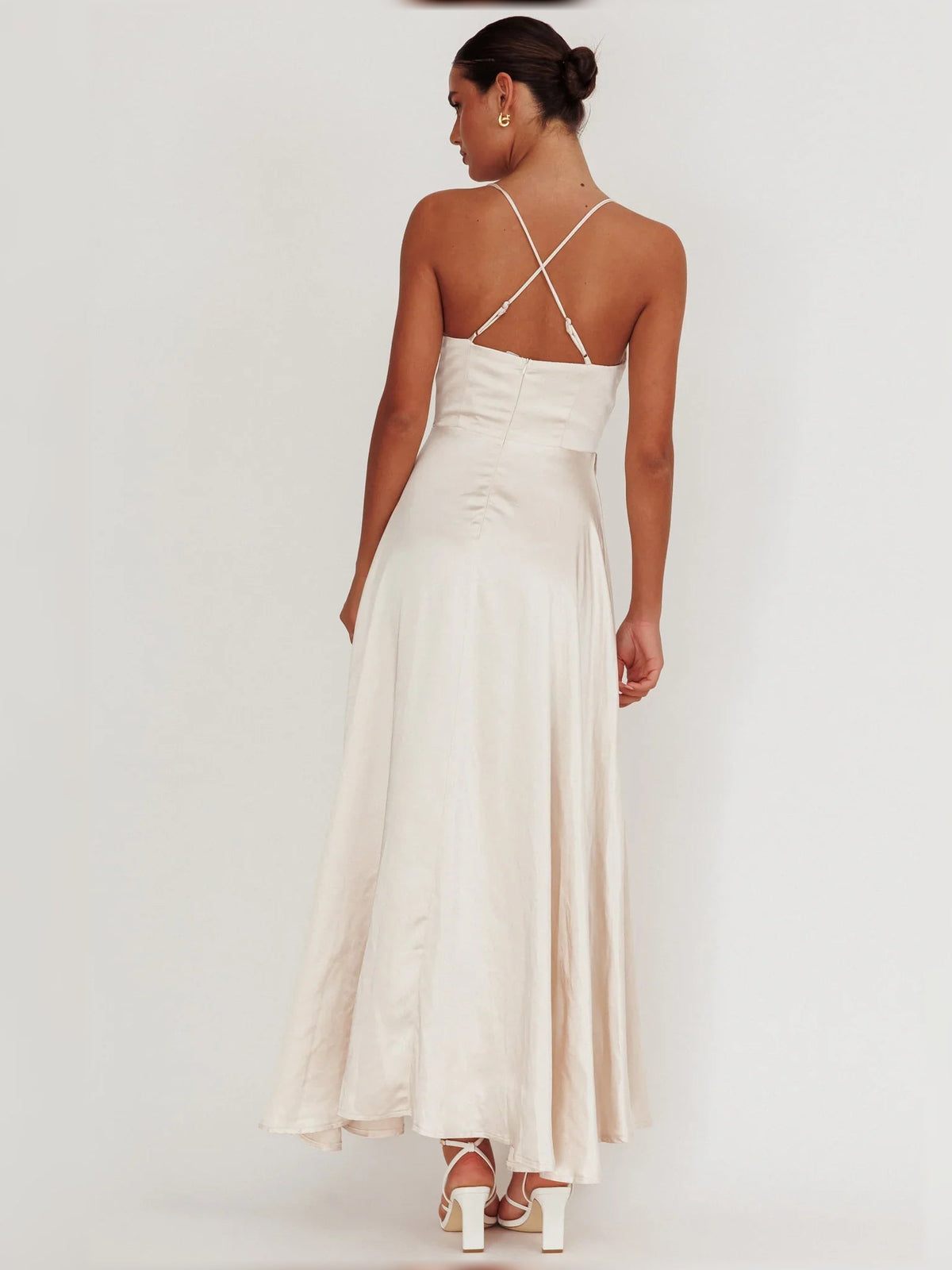 Cream cowl-neck formal dress with crisscross spaghetti straps, side slit, maxi length