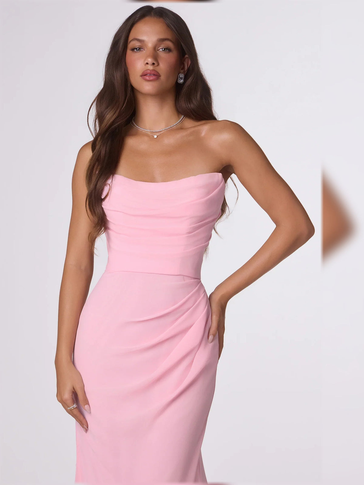 Strapless ruched formal dress in light pink, floor-length fitted silhouette