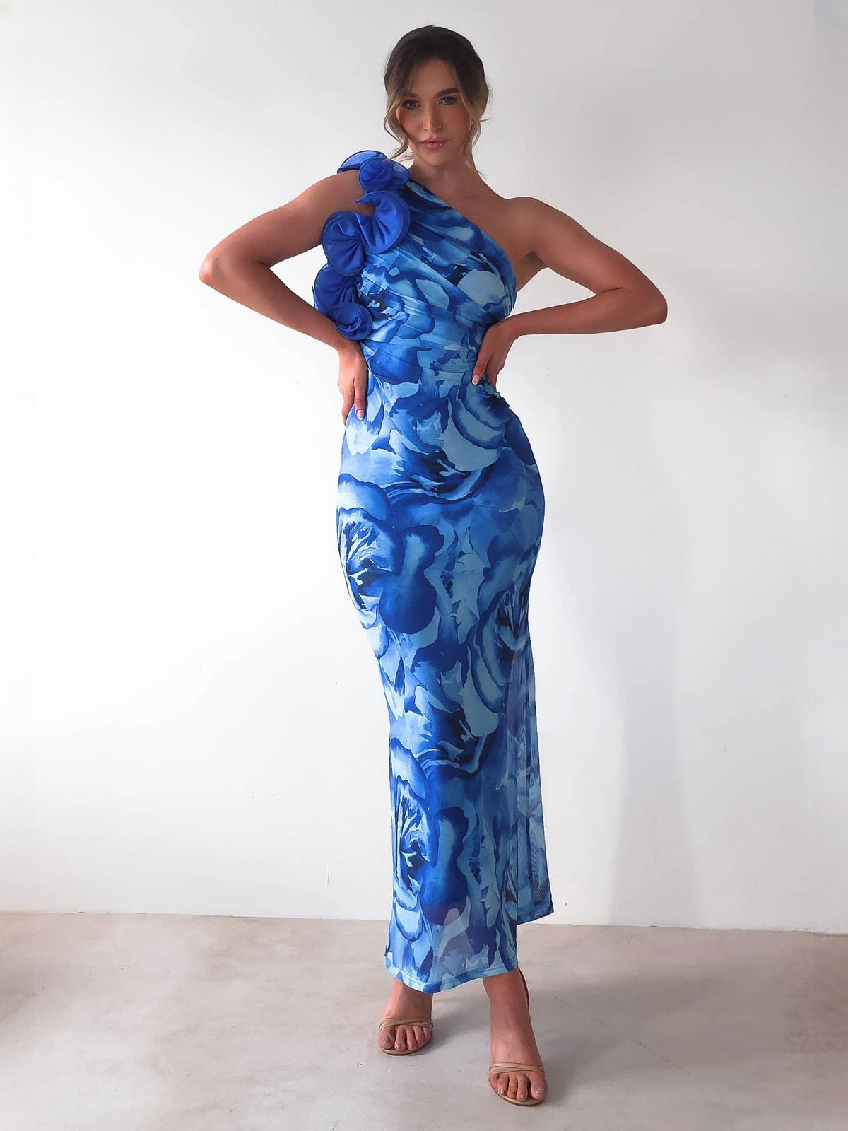 Blue sheath maxi formal dress with floral print, alternate full-length view showing the skirt