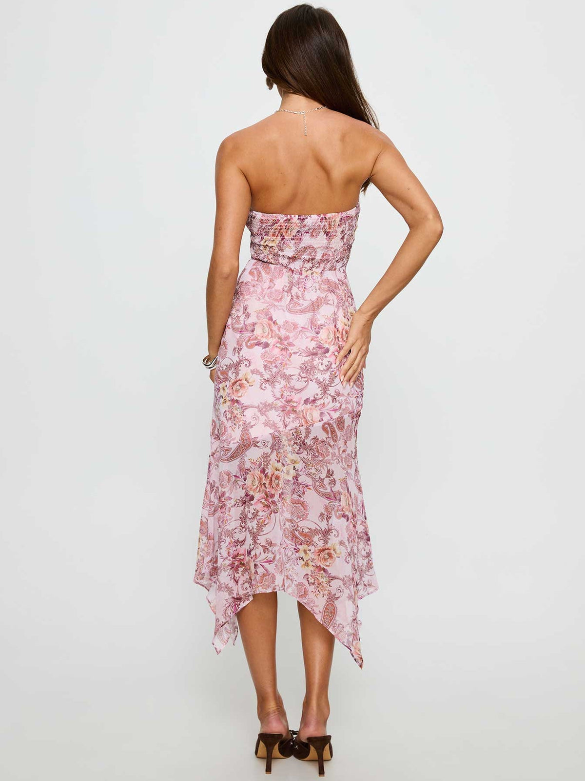 Pink paisley strapless midi dress, back view with fitted bodice and high-low hem.