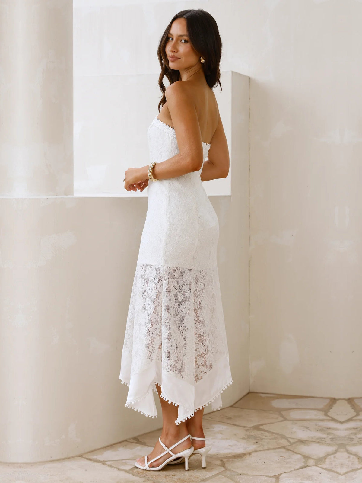 White sheath maxi formal dress with strapless neckline, alternate view showing the skirt