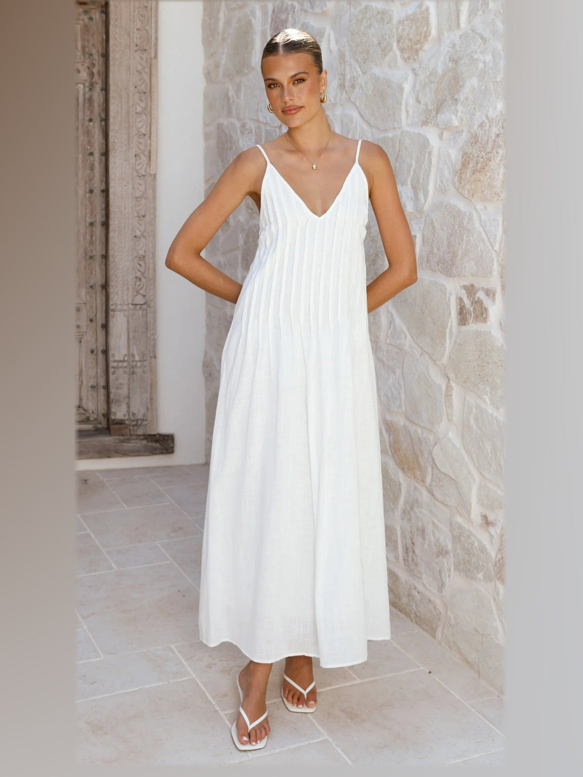 White midi formal dress, alternate full-length view showing the hem