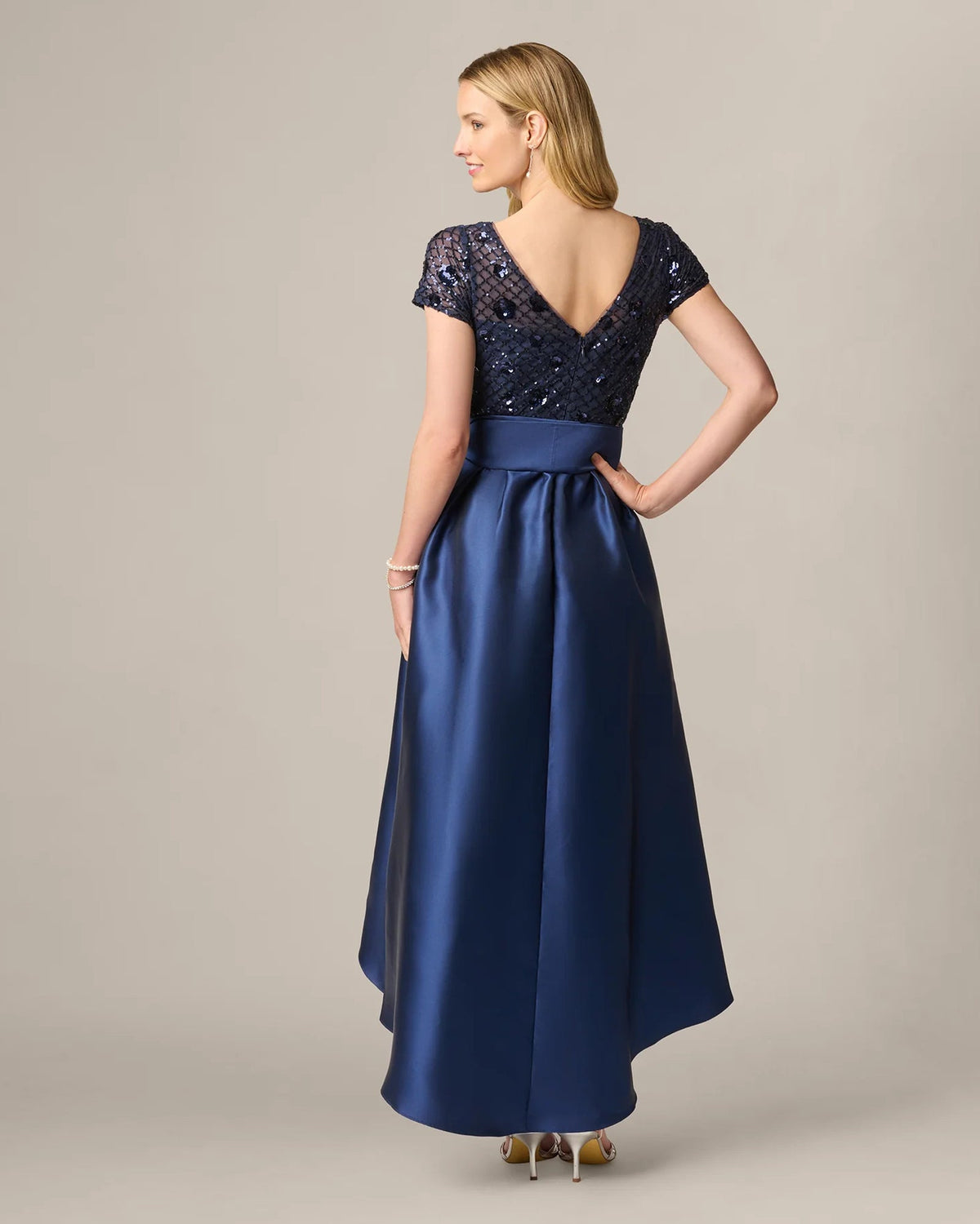 Navy embellished V-back maxi dress with sequined cap sleeves and satin bow waist