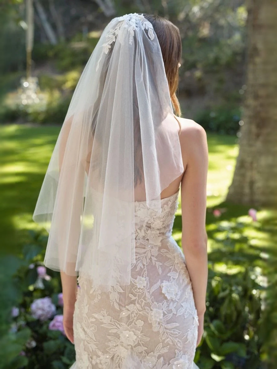 Ivory lace backless mermaid wedding dress with sheer tulle back drape