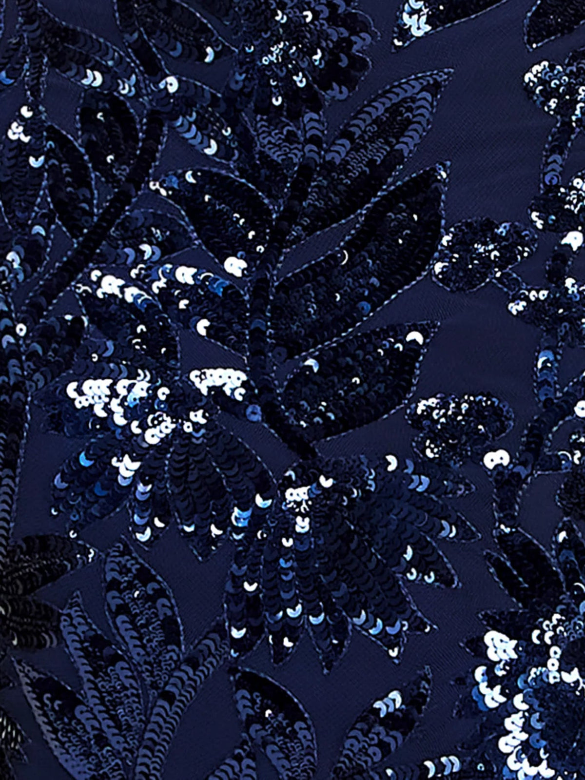 Navy sequin floral embellishment fabric close-up with shimmering pattern
