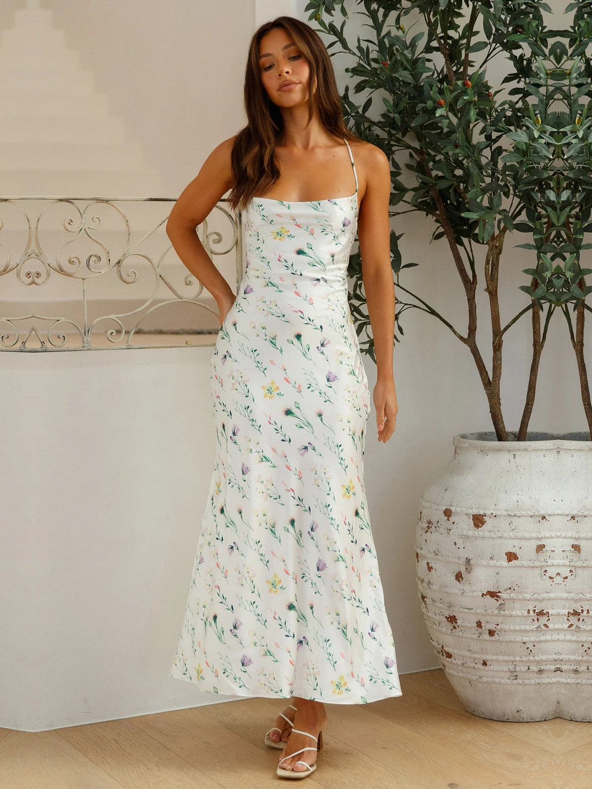 White a-line maxi formal dress with floral print, alternate view showing the skirt