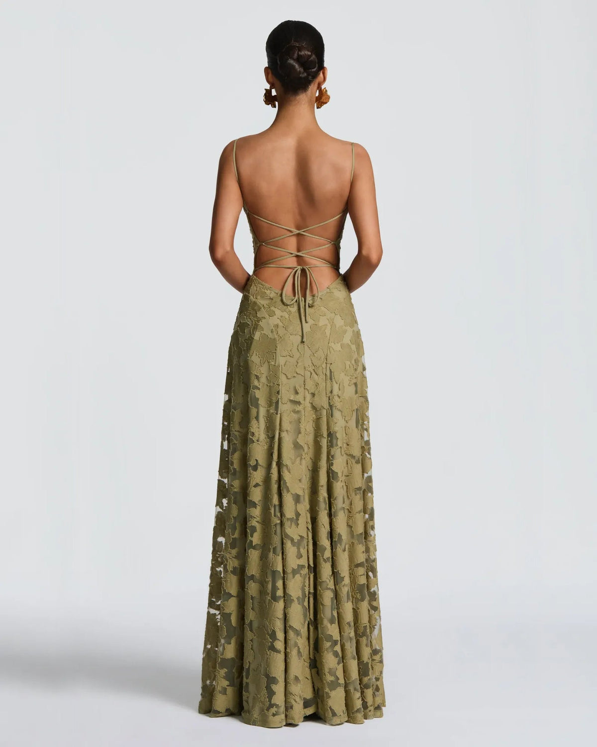 Back view of olive floral lace A-line dress with lace-up tie
