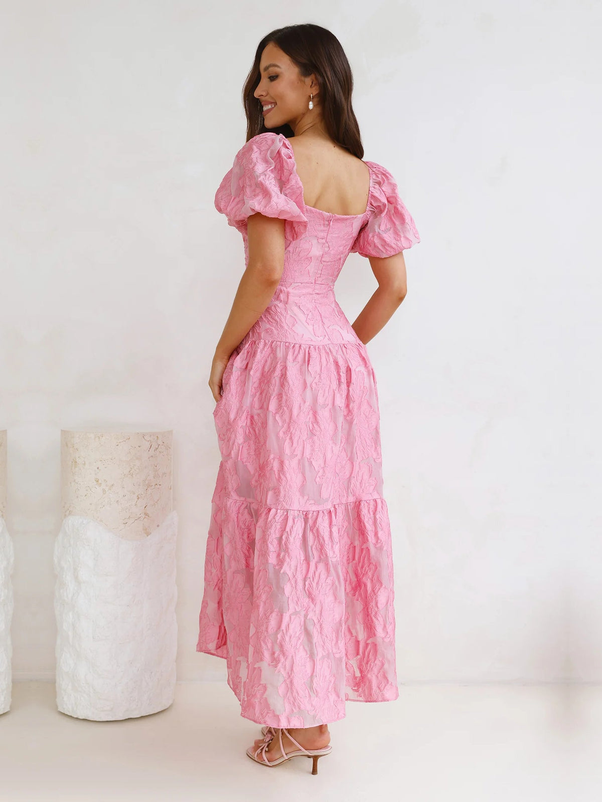 Pink side view tiered maxi dress with puff sleeves and V-neck bodice